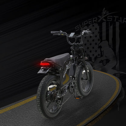 Super X Star E Times JR electric bike rear view with LED taillight on black road background